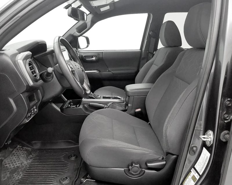 Toyota Tacoma front bucket seats with round driver control knob (adjusts seat lumbar)